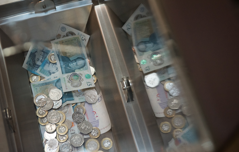 Donation box with money, Weston Library, Oxford