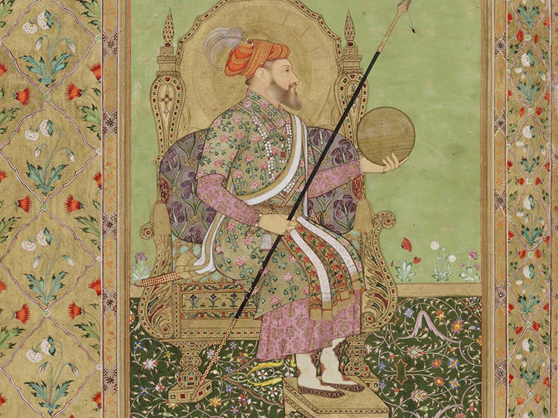 A detailed painting of a man wearing fine robes and holding a spear and shield; the image is surrounded by floral patterns