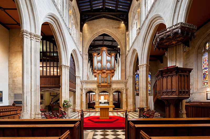 The vaulted stone interior of the University Church, showing the altar
