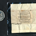 Commemorative medal and wrapper, engraving reads Great Exhibition of the Industry of all Nations, London 1855