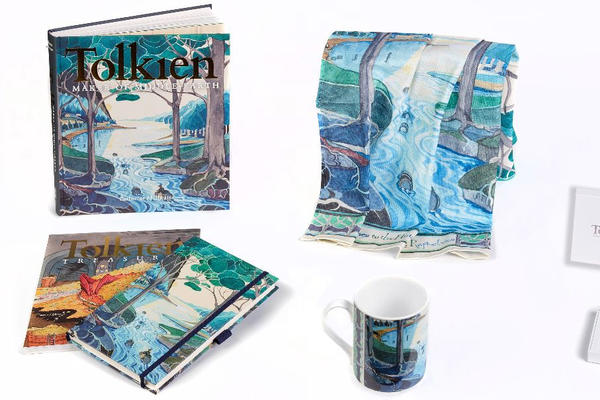 A book, scarf, mug and notebook all decorated with illustrations inspired by JRR Tolkien