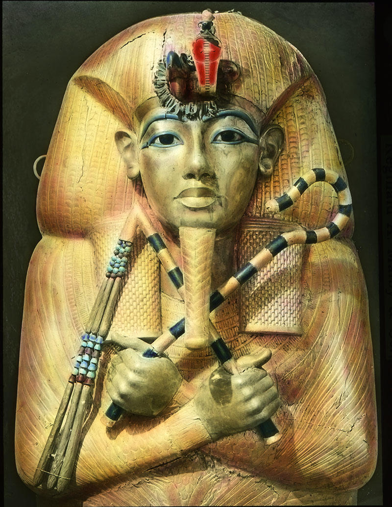 A golden death of an Egyptian pharoah wearing a headress