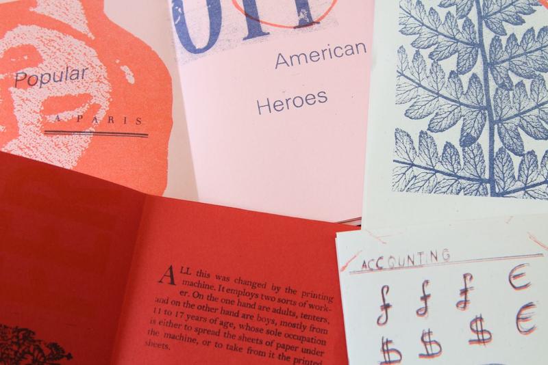 An assortment of colourful printed and hand-drawn zines