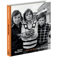 A book cover showing a black and white photograph of three young boys standing next to each other, the central boy holds a pigeon